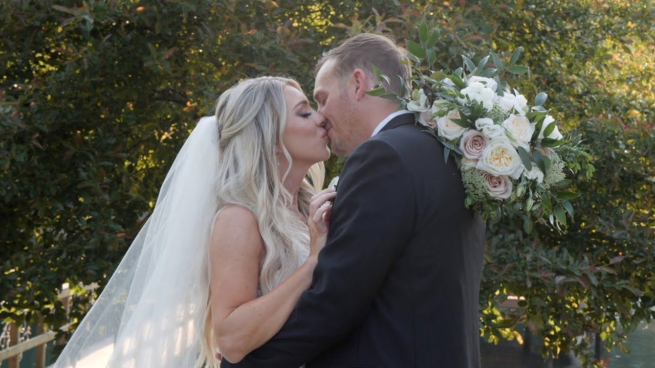 Cinematic still from a Lucas Studios NC wedding film — Emily and Chris on their Walnut Hill wedding day.